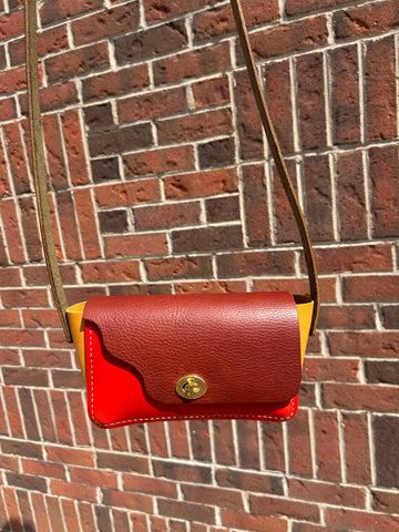 Swiggly Crossbody purse in Brown, Red, & Yellow!